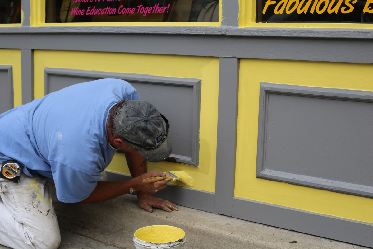 Hand-cut trim work on a storefront facade